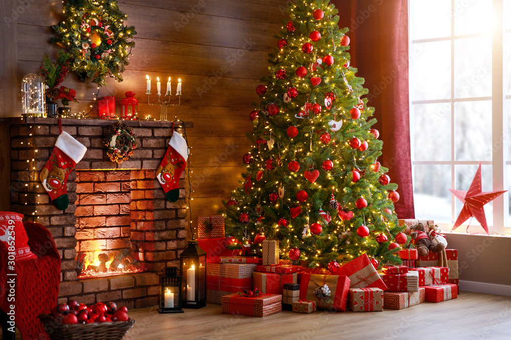 interior christmas. magic glowing tree, fireplace, gifts  . - obrazy, fototapety, plakaty 