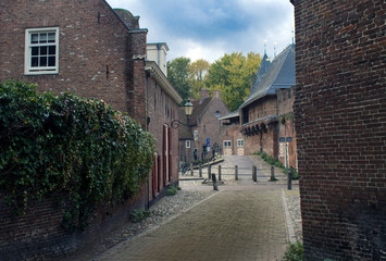 Medieval fortress city wall gate Koppelpoortin the city of Amersfoort, Netherlands