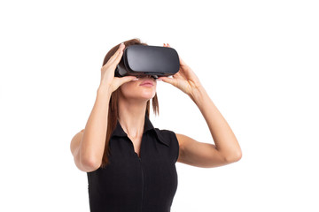 Young 20s Caucasian woman holding VR headseat, isolated