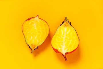 Wall Mural - yellow beetroot on the orange background