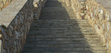 Fototapeta Na drzwi - The stone staircase leading up is entirely made of stone