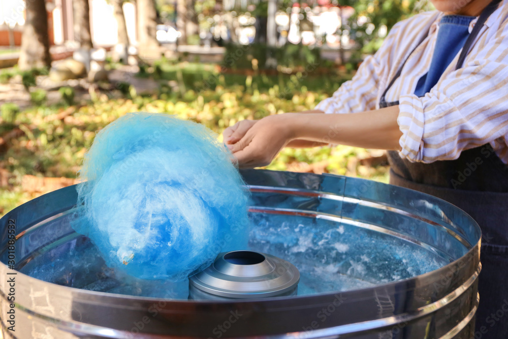 Making of sweet cotton candy outdoors