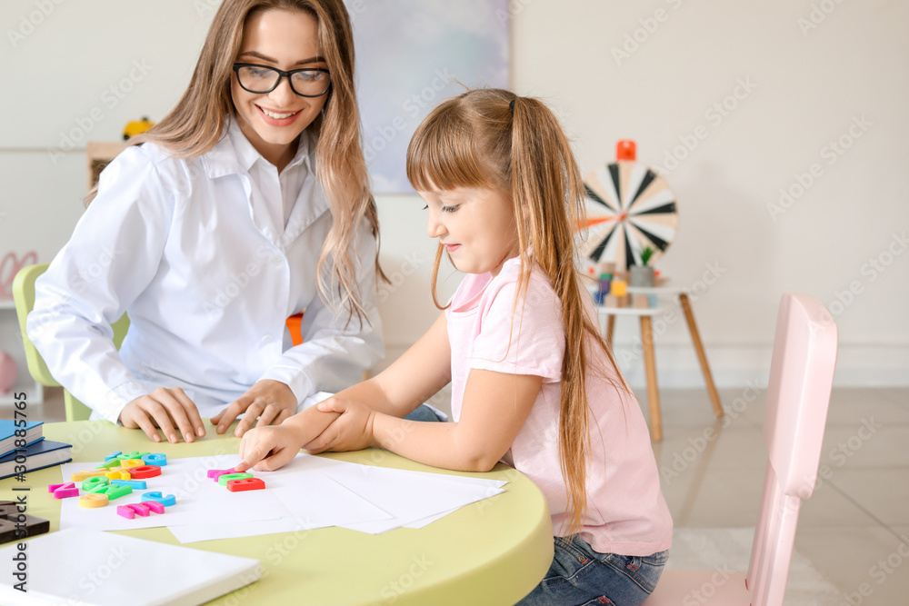 Cute little girl at speech therapist office