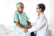© Art_Photo - Doctor consulting and check up information with senior woman in hospital.elderly woman has sick.healthcare and medicine
