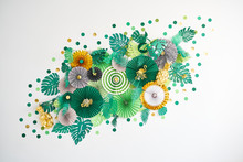 Green, Emerald, Gold And Yellow Papers Circle Shape Of Origami. Abstract Background Of Paper Designs. Copy Space.