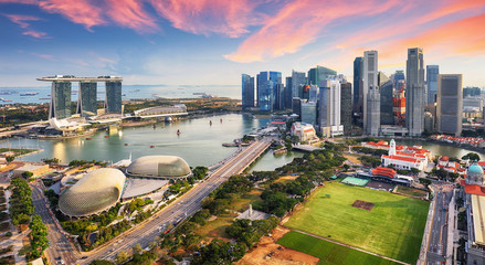 Wall Mural - Aerial view of Cloudy sky at Marina Bay Singapore city skyline