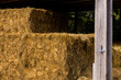 stack of hay in a hay barn