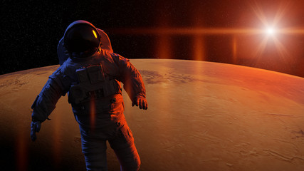 Wall Mural - astronaut during a space walk in orbit of planet mars