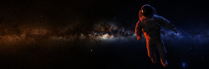 Wall Mural - astronaut in front of the milky way galax