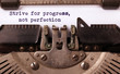 Strive for progress, not perfection - Written on an old typewriter