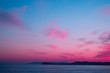 Beautiful pink sunset on the sea with blue sky