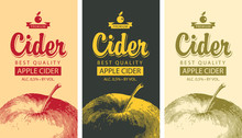 Set of vector labels for Apple cider with a realistic image of an apple and calligraphic inscription in retro style