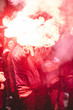 Protesters with a red torch and smoke - 9/12