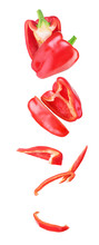 Sweet Red Pepper Sliced And Falling Isolated On A White Background