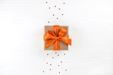 Christmas gift box on white sparkling background. Festive concept.