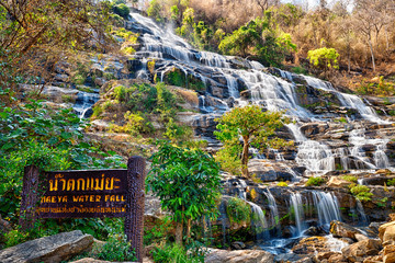 Mae Ya Waterfall is one of the most beautiful cascades in Doi Inthanon, Chiang Mai. Water flows from a 280-metre steep cliff onto different rock formations in a lower basin, creating a beautiful scene