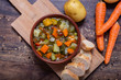 Mixed vegetable soup with bread view from the top. Winter food, detox food, minestrone soup