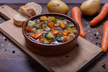 Wall Mural - Mixed vegetable soup with bread. Winter food, detox food, minestrone soup