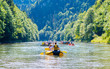 Traditional rafting on the Dunajec River on wooden boats. The rafting is very popular tourist attraction in Pieniny National Park