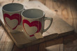 cups of tea with a heart drawn