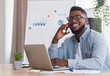 © Prostock-studio - Happy black businessman talking on phone, receiving good news