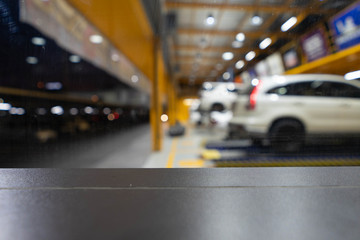 table with blur background garage for car service