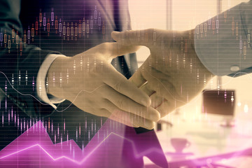 Multi exposure of financial graph on office background with two businessmen handshake. Concept of success in business