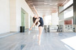 Ballet dancer balancing on tiptoe in dance practice in the city