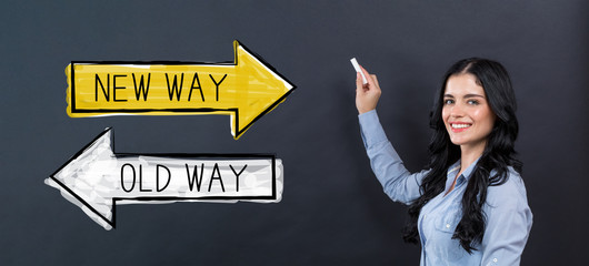 Poster - Old way or new way with young woman writing on a blackboard