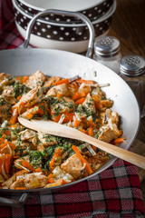 Canvas Print - Fried chicken pieces with vegetables.