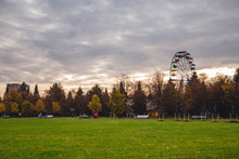 Ferris Wheel In The Park In Autumn