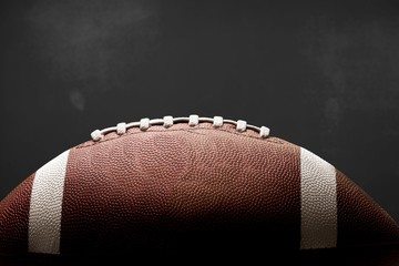 Wall Mural - American football ball on background