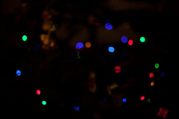 Wall Mural - Defocused colored Christmas lights