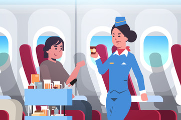 Wall Mural - flight attendant serving drinks to passenger stewardess in uniform pushing trolley cart professional service travel concept modern airplane board interior portrait horizontal flat vector illustration