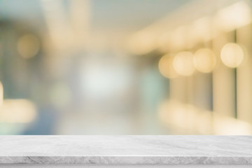 empty white marble stone table top and blur glass window interior restaurant banner mock up abstract