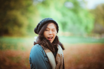 Charming Asian woman portrait in autumn season