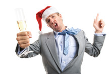 Office Worker Businessman In Santa Hat Raising A Champagne Glass In A Sloppy Drunken Toast On White Background