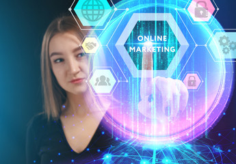 Business, Technology, Internet and network concept. Young businessman working on a virtual screen of the future and sees the inscription: Online marketing