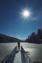 Traveling Around Frozen Lake At A Sunny Winter Day 