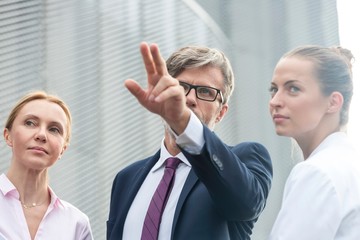 Wall Mural - Business people on meeting in office rooftop