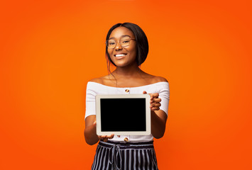 Black Young Woman Showing Tablet Blank Screen Standing, Studio, Mockup