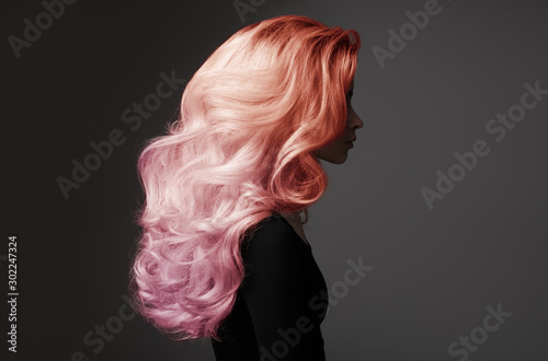 Cuadros en Lienzo Portrait of beautiful woman with colorful wavy hair.