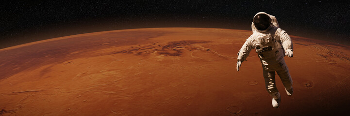 Wall Mural - astronaut waving during a space walk in orbit of planet mars