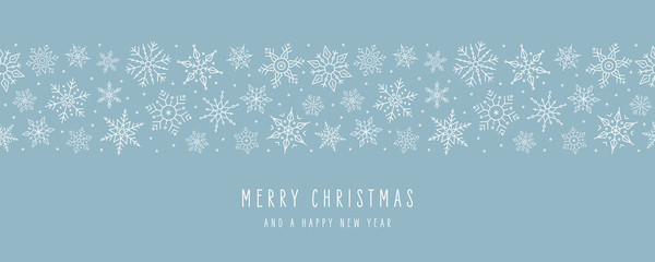 Wall Mural - christmas ice snowflakes elements ornaments seamless banner greeting card on ice blue background