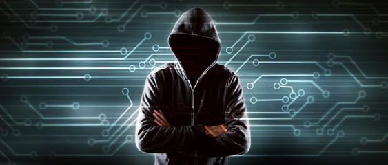 Cybersecurity, computer hacker with hoodie