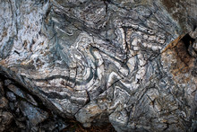 Distinct Patterns Are Formed In The Rocks In Mountains.