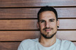 © Cavan Images - Closeup portrait of a handsome happy man
