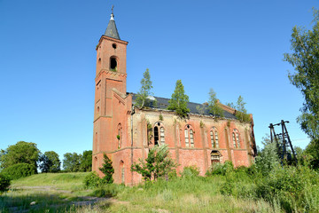 Wall Mural - Kirha of Gross Krishzanen on a summer day. Village of Zapovednoe, Kaliningrad region