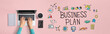 © Tierney - Business plan with person using a laptop computer