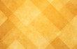 © Attitude1 - gold abstract background with angled lines, blocks, squares, diamonds, rectangles and triangle shapes layered in checkered style abstract pattern